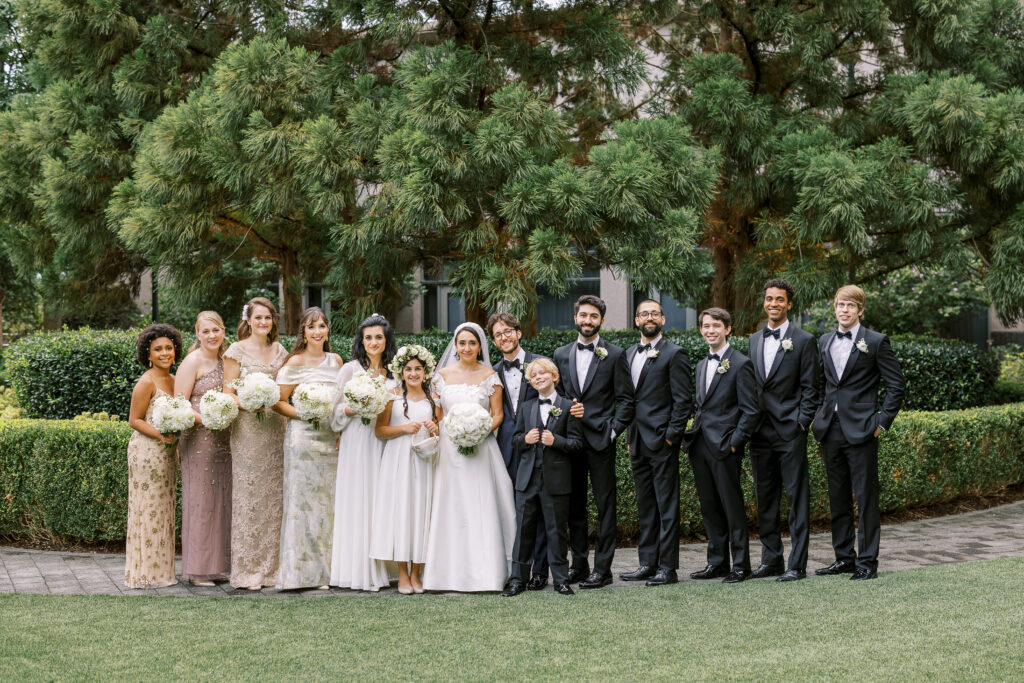 bride and groom with their wedding party