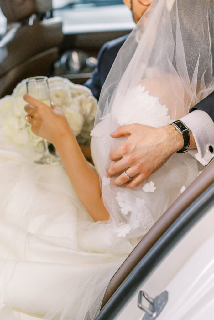 bride and groom in a car