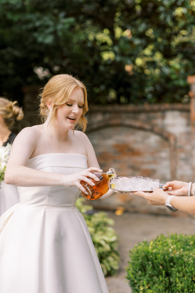 bride pouring bourbon