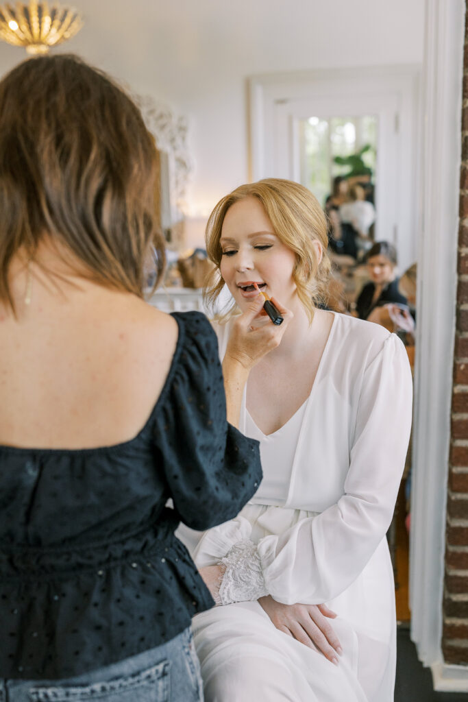 bride getting make-up done