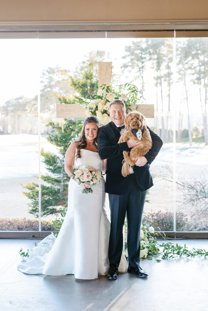 bride, groom, and their dog