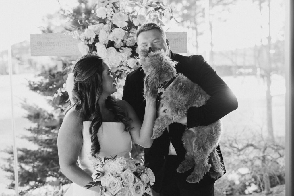 bride, groom, and their dog
