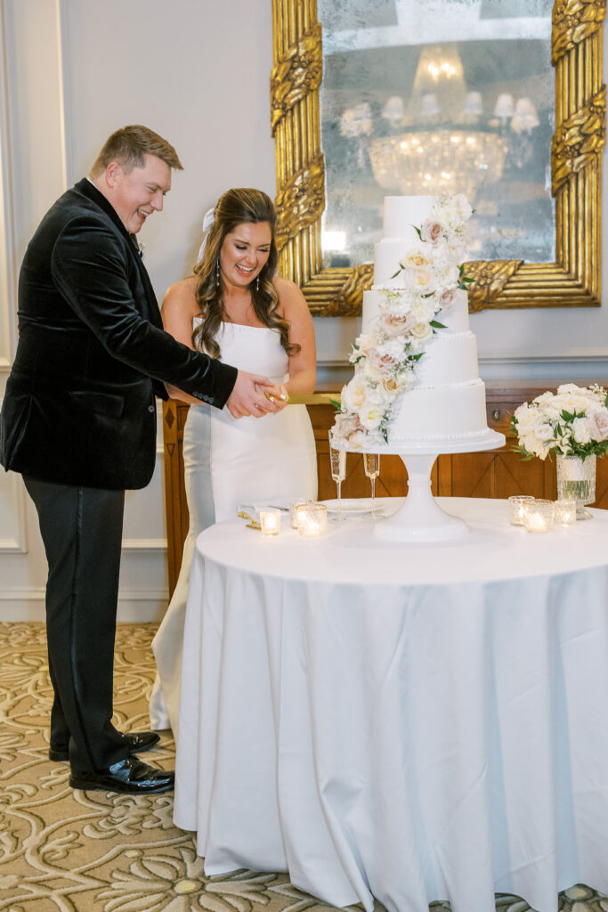 cutting the cake at a wedding reception
