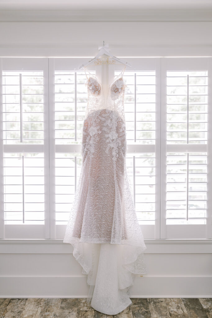 a wedding dress in the window