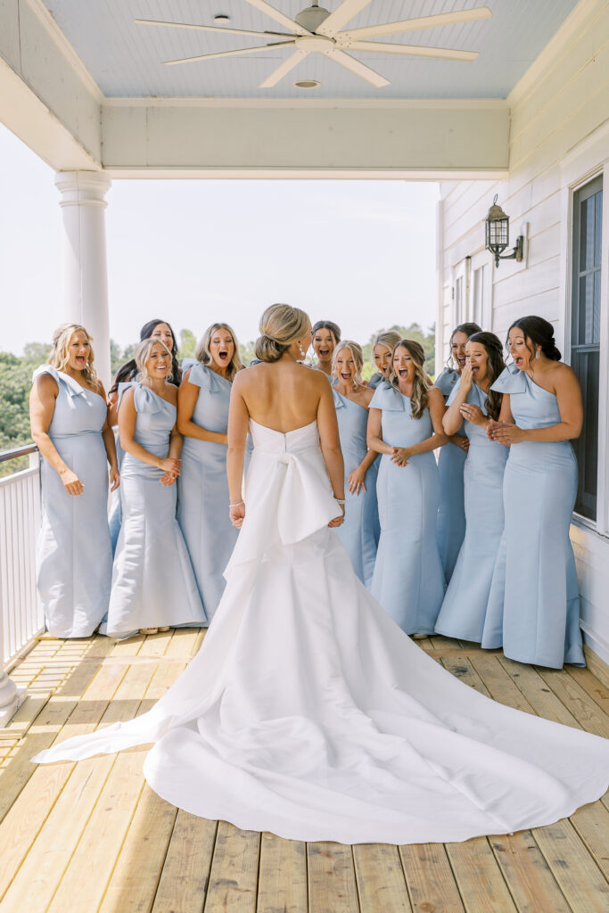 bride's first look with her bridesmaids
