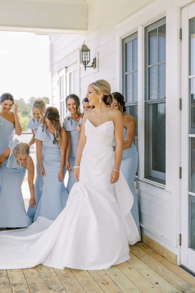 bridal first look with her bridesmaids