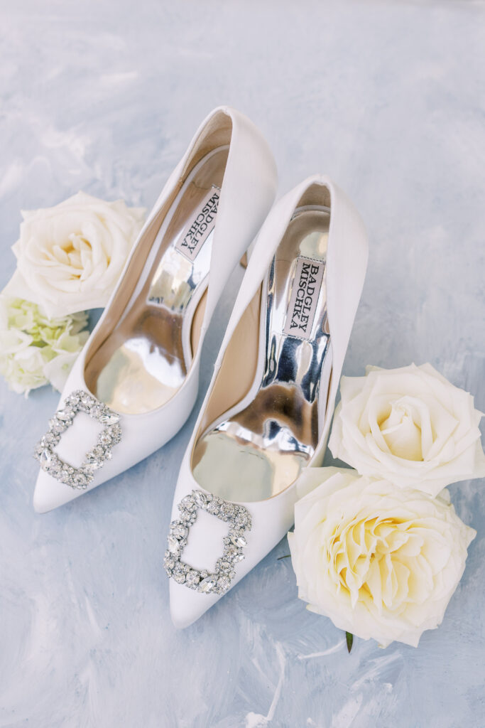 the bride's high heels and roses