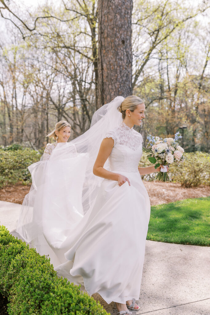 bride walking with her mom