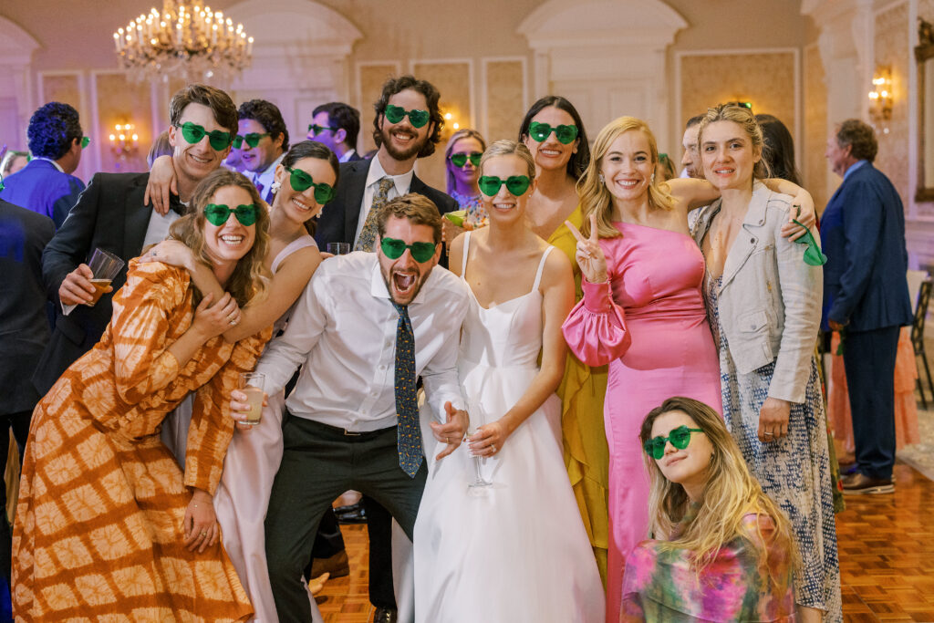 wedding guests and bride wearing sunglasses