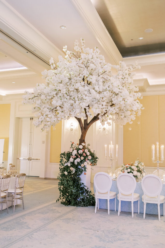 wedding floral display with a tree