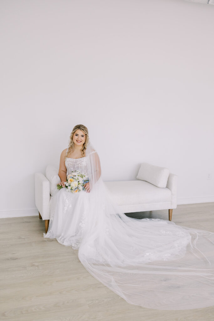 A bridal portrait session at Birdie & Co Studio in Athens, Georgia with a bouquet made by Oakwood Lace & Co