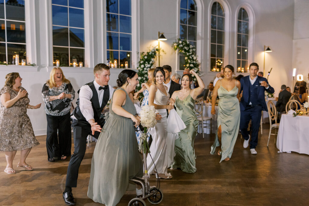 bride and bridesmaids dancing