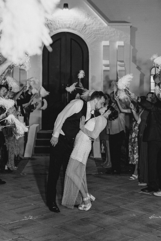 bride and groom leaving wedding reception