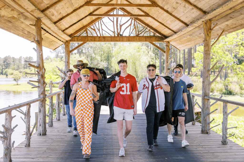 groom and groomsmen entering the wedding