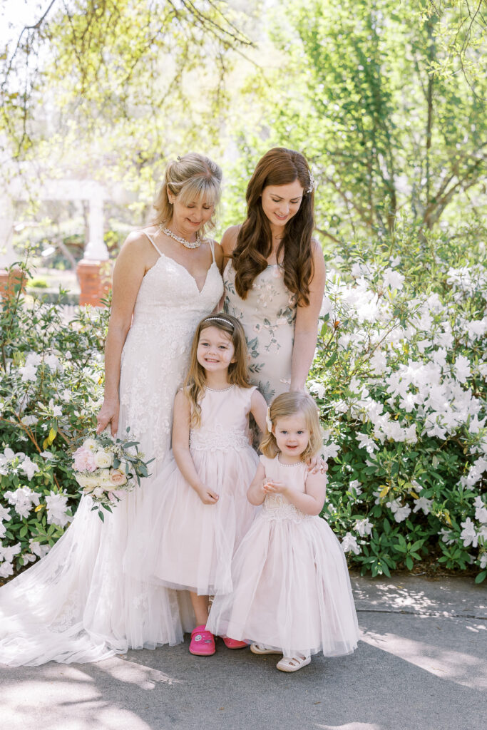 portrait of the bride, her granddaughters, and her daughter at the state botanical gardens of georgia in athens