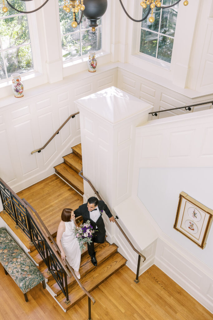 bride and groom entering their reception