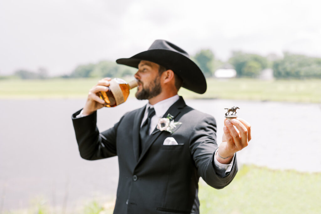 groom drinking blanton's bourbon