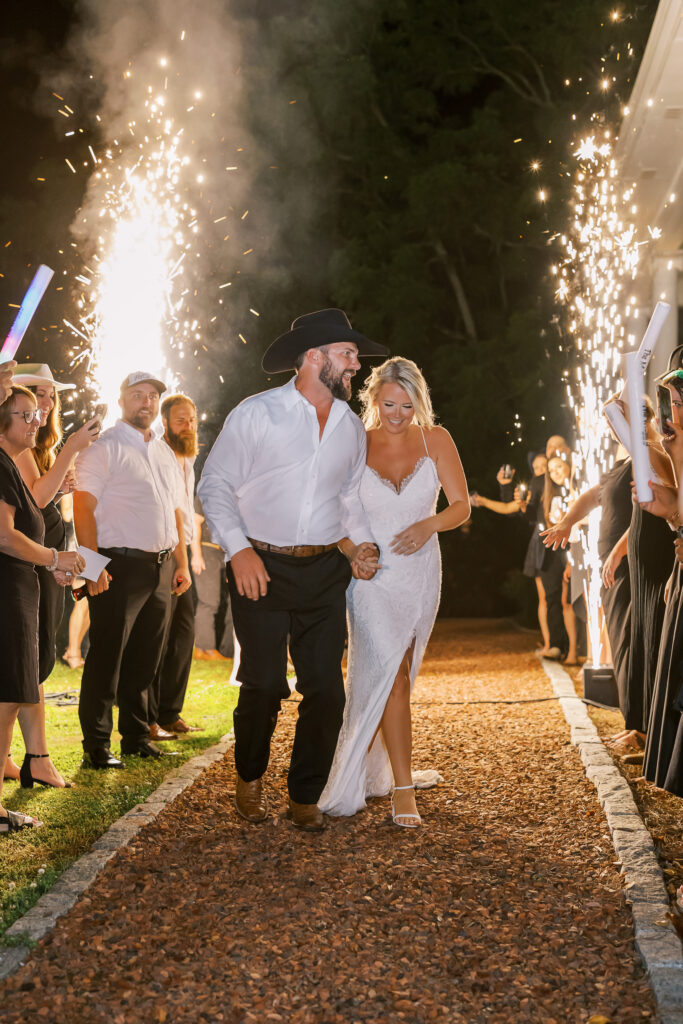 bride and groom leaving the reception