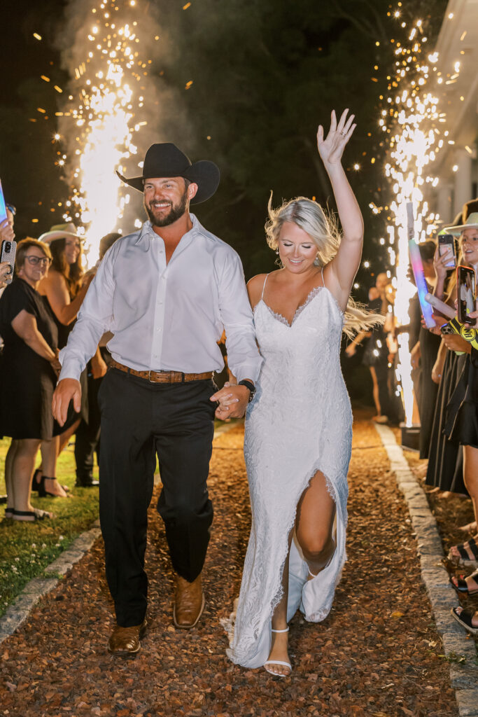 bride and groom leaving the reception