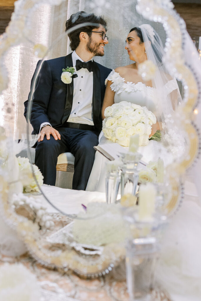 bride and groom portrait through the sofreh