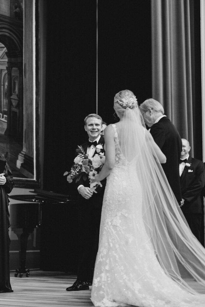 groom seeing his bride