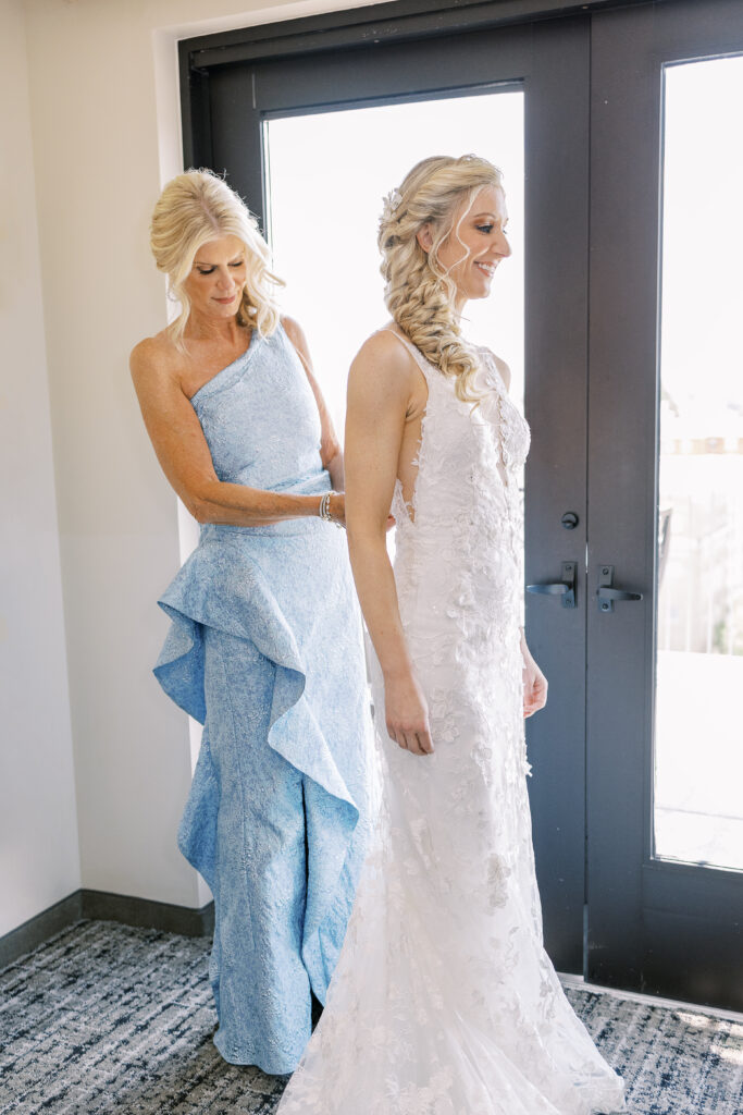 bride and mother getting ready