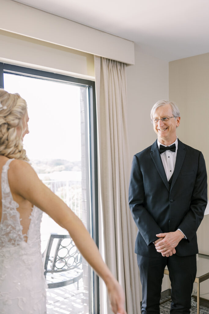 father's first look of his daughter the bride