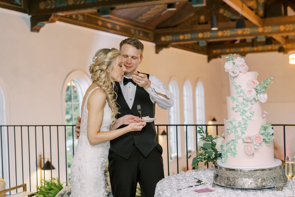 bride and groom eating cake