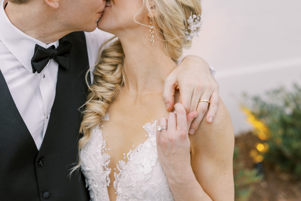 bride and groom kissing