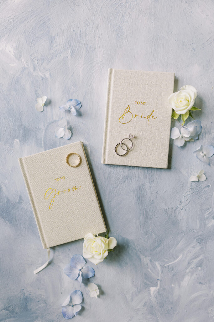 journals and wedding rings