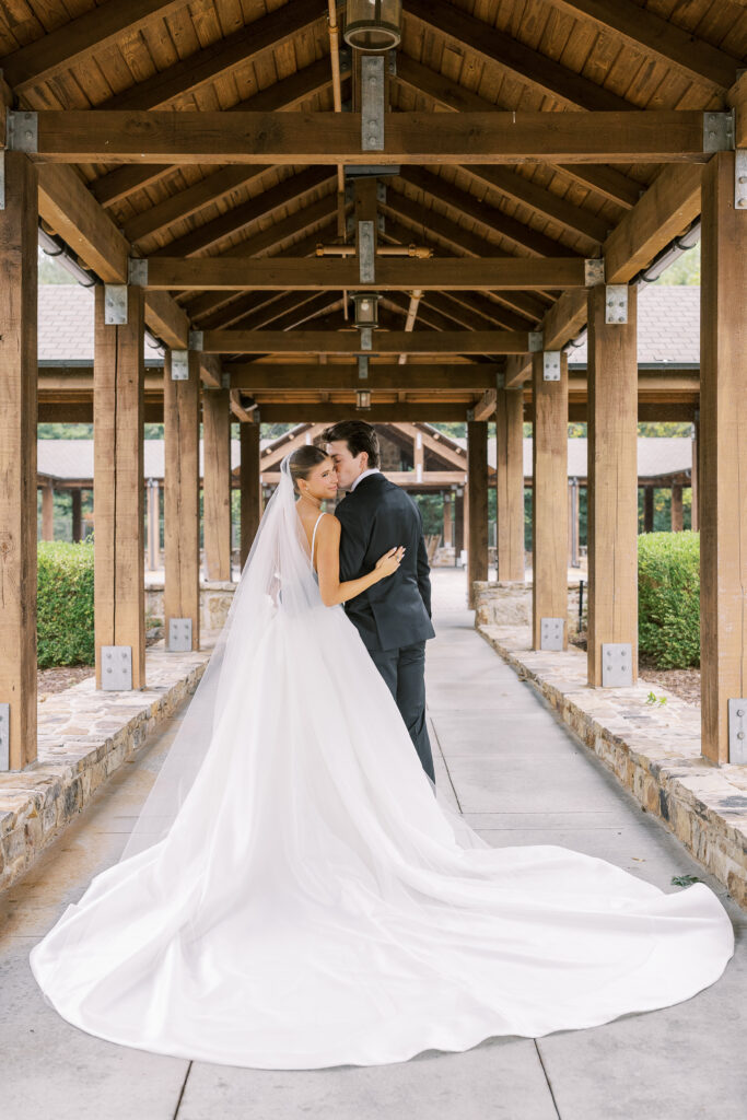 bride and groom outside of their venue