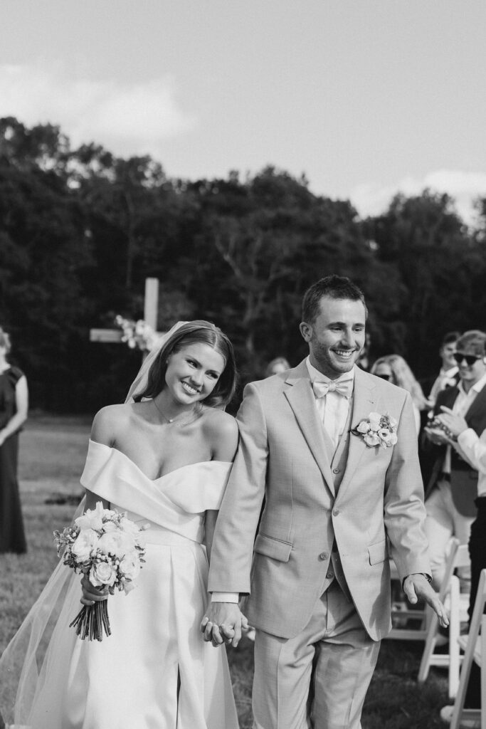 bride and groom leaving their wedding ceremony