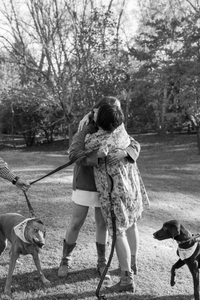 girl hugging her mom after getting engaged