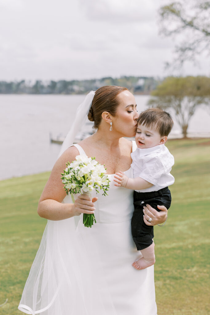 bride kissing her son