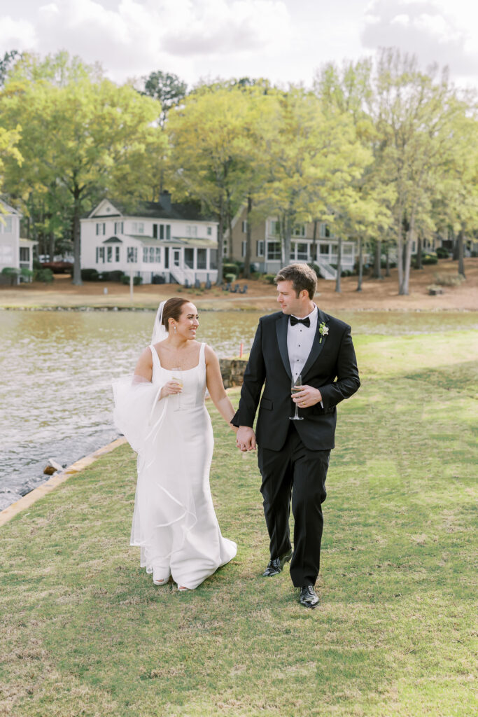 bride and groom drinking champagne