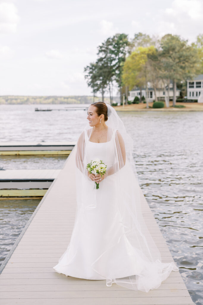 portrait of the bride alongside the lake