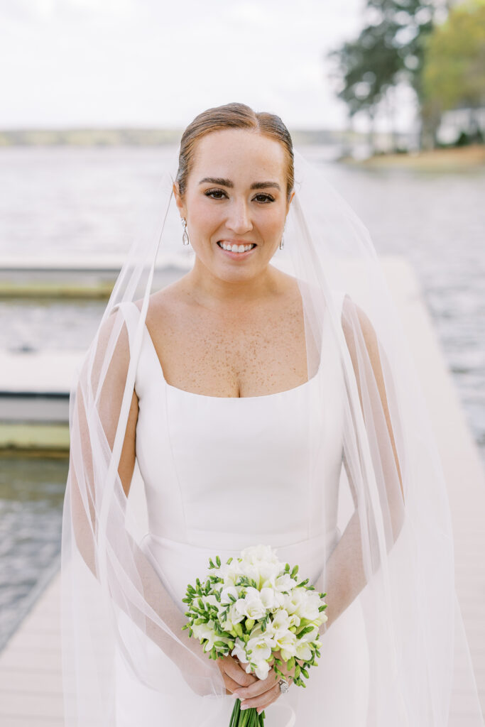 portrait of the bride alongside the lake
