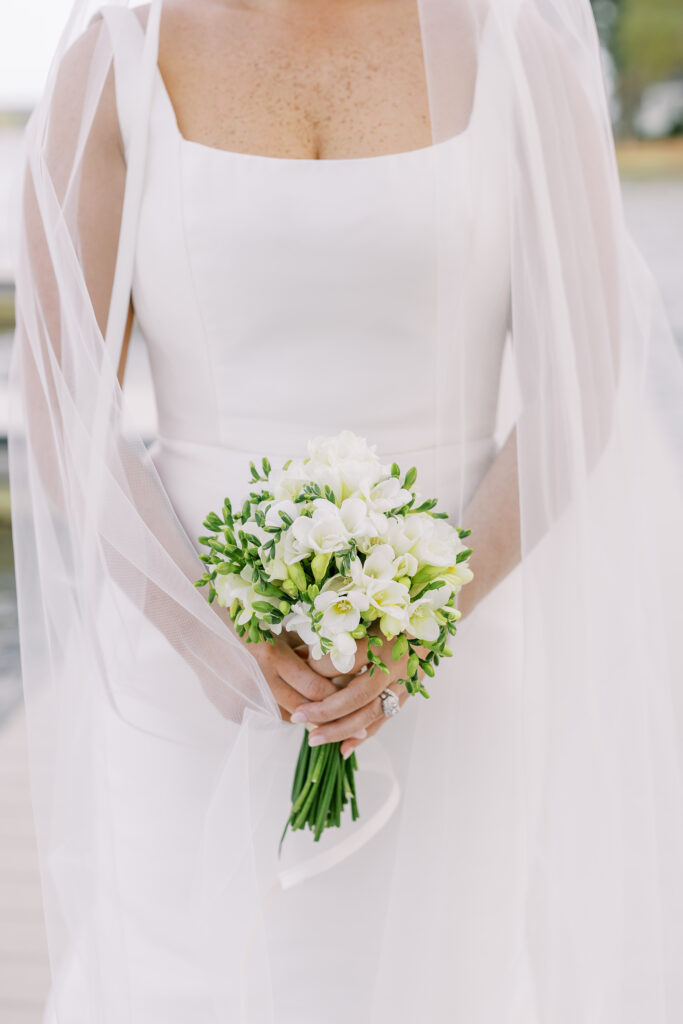 portrait of the bride alongside the lake