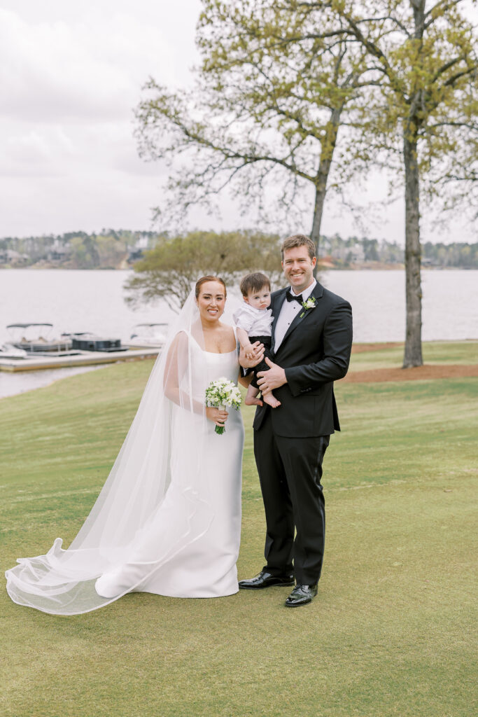 bride and groom first look with their son
