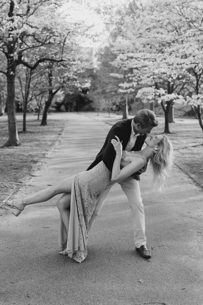 a couple's engagement session in downtown atlanta at piedmont park