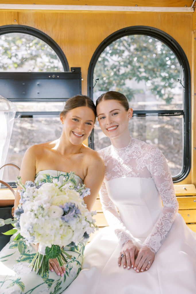 bride and the maid of honor on the trolley