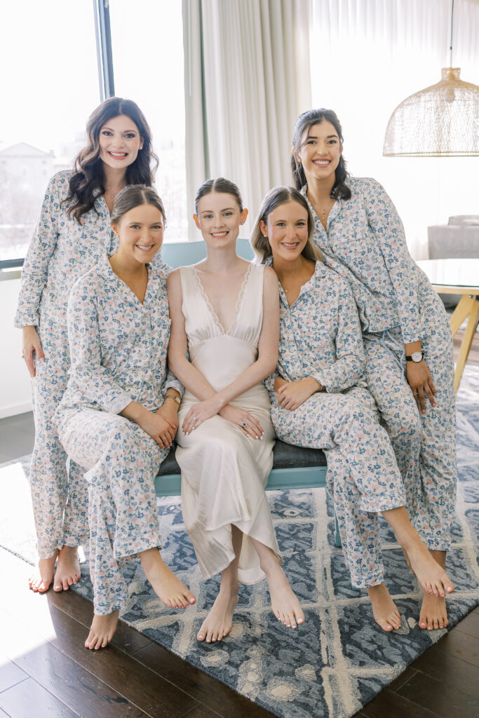 bride and her bridesmaids getting ready