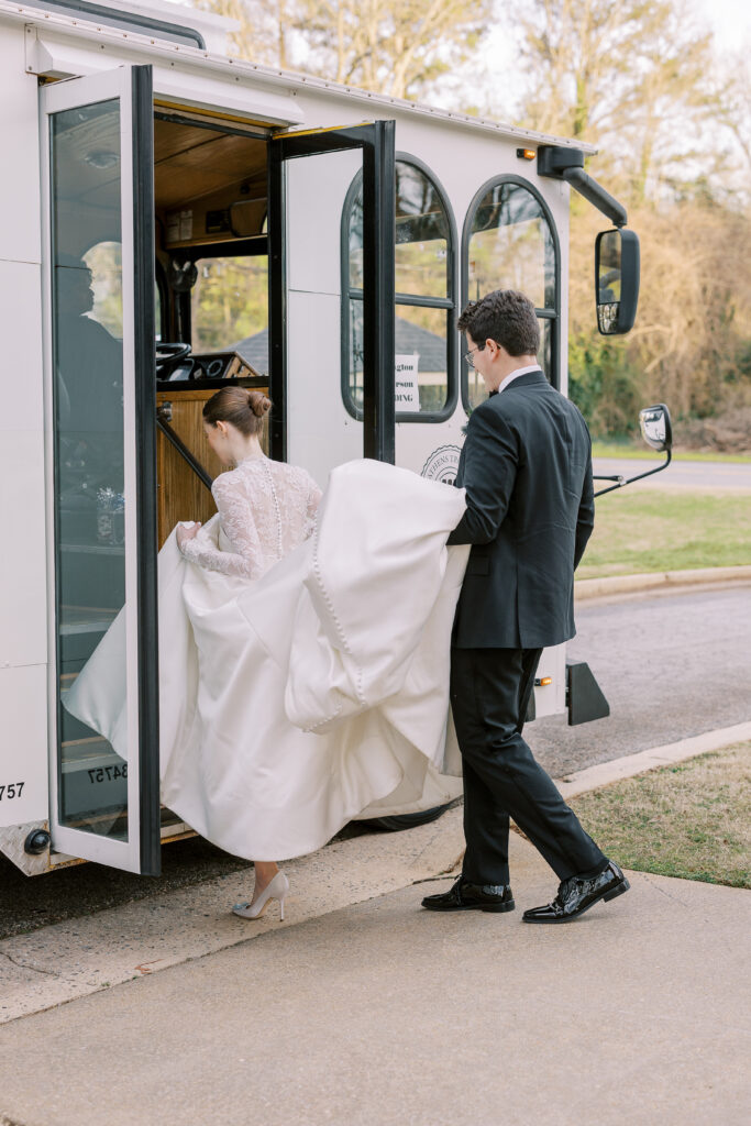 bride and groom on the athens trolley