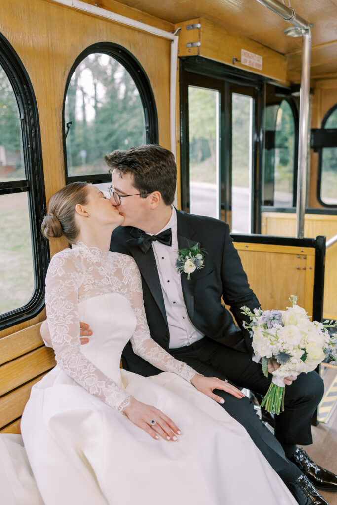 bride and groom on the athens trolley