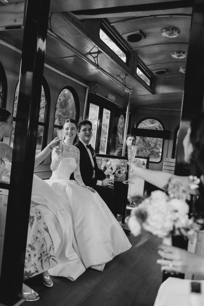 bride and groom on the athens trolley