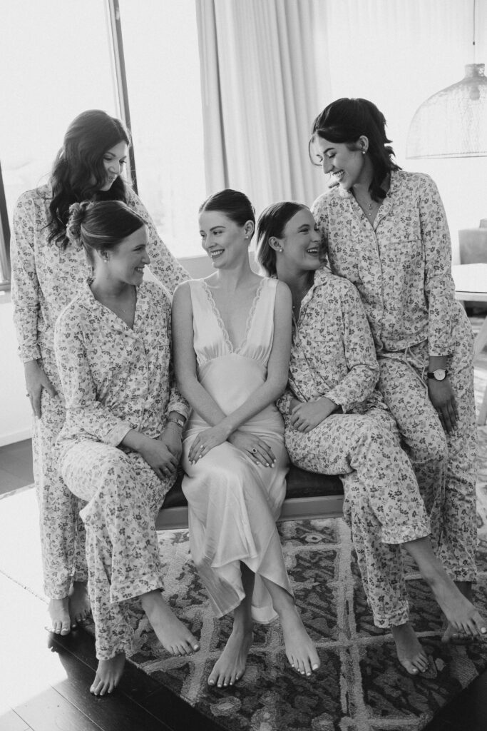 bride and her bridesmaids getting ready