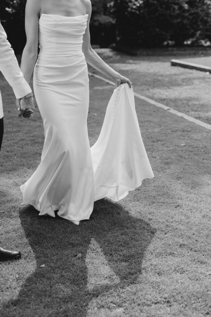 bride carrying her train