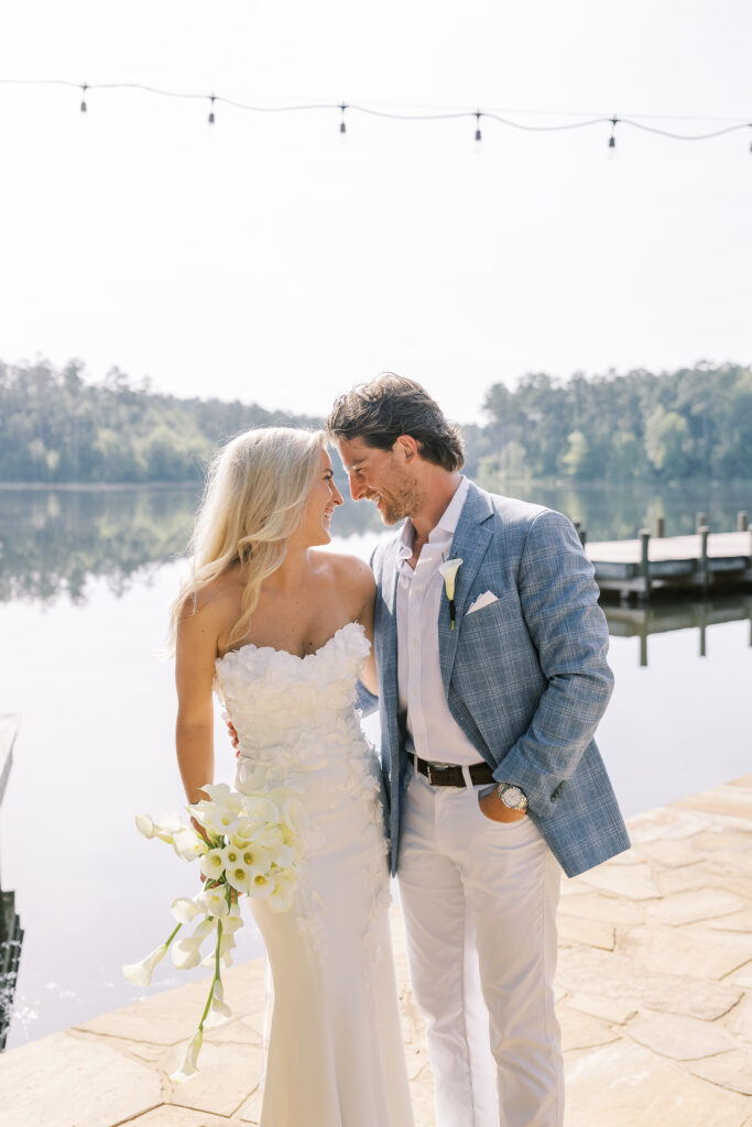 lakeside portrait of a bride and groom