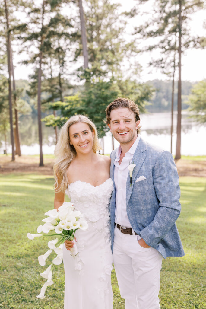 lakeside portrait of a bride and groom