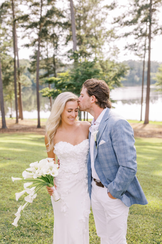 lakeside portrait of a bride and groom